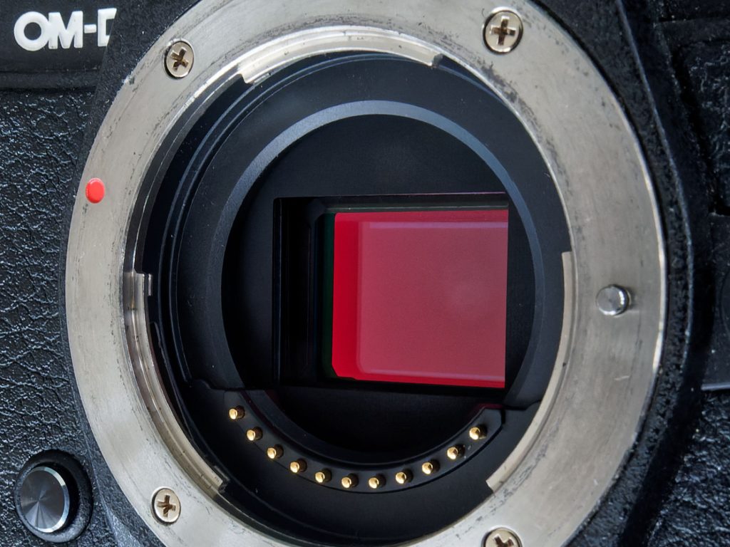 View inside the front of an OMD camera to see the sensor area